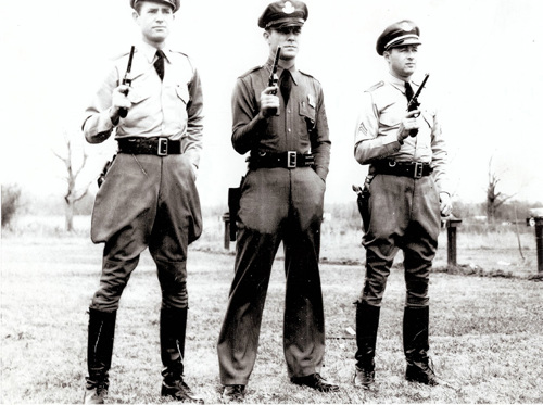 Historical Image of 3 Troopers holding Guns