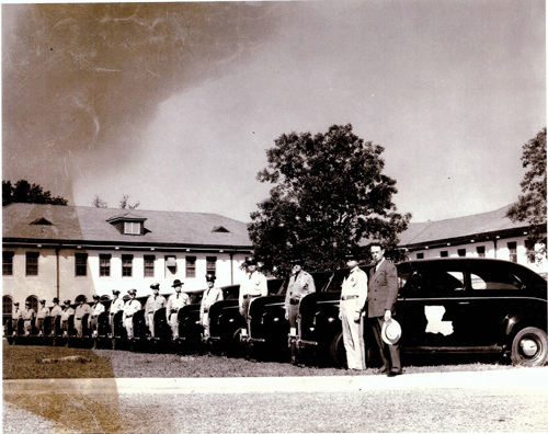 Historical Image of Troopers in front of marked units