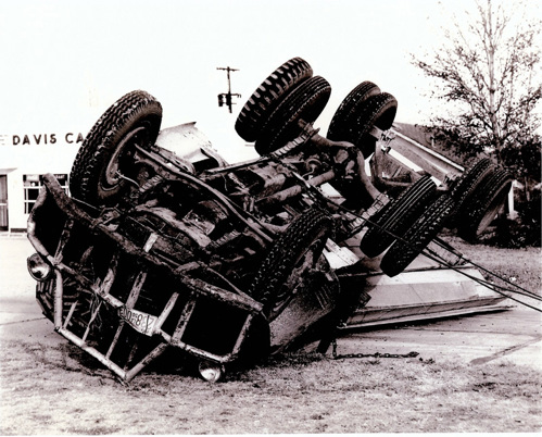 Historical image of a flipped vehicle
